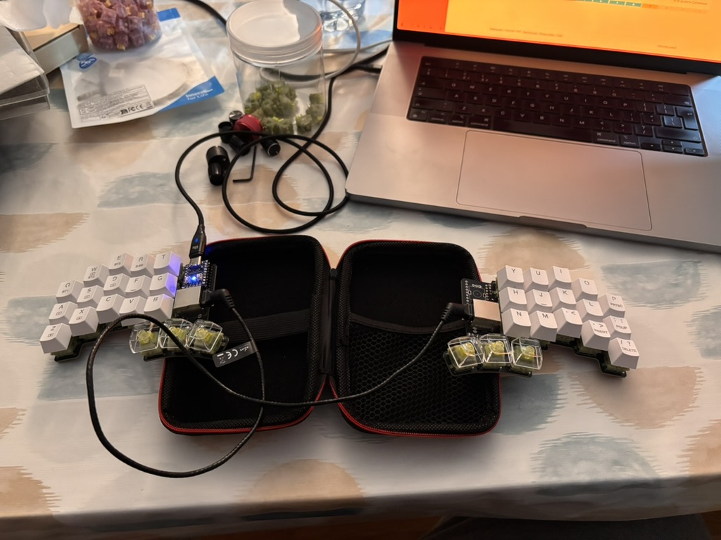 A split keyboard with white and transparent keys