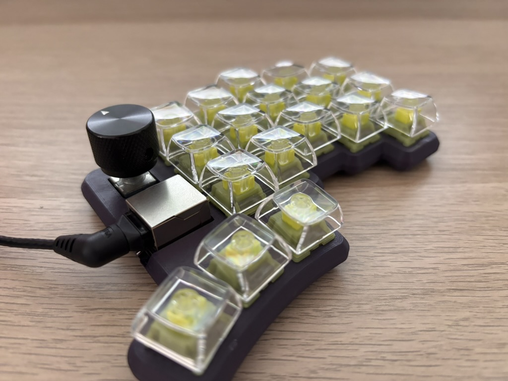 Half a split keyboard with transparent keycaps